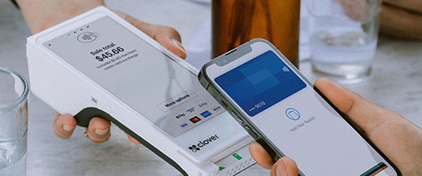 Tapping a phone on a payment machine 